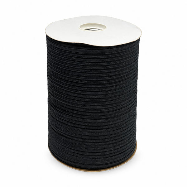 1/4" Pat 17A Black Pre-Shrunk Cotton Garment Tape wound on a spool.